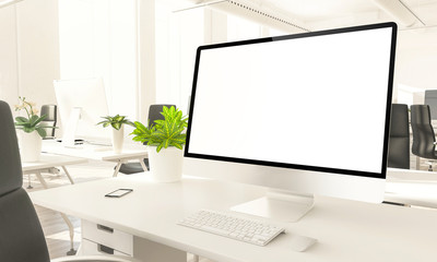 blank screen mockup computer in loft office