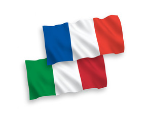 National vector fabric wave flags of France and Italy isolated on white background. 1 to 2 proportion.