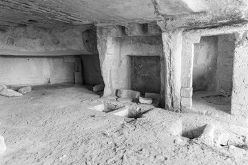 Massafra and its ravines. Houses built in the rock. Puglia in Black and White. Italy