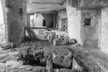 Massafra and its ravines. Houses built in the rock. Puglia in Black and White. Italy