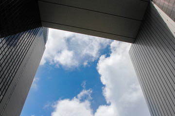 Window glass, Modern architecture in the blue sky white cloud city