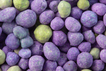 Purple mineral fertilizer, prolonged action with microelements, for application to the lawn in the spring. Professional fertilizer.