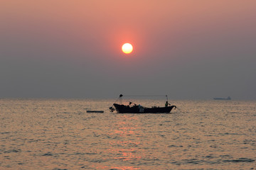 Sunrise and sunset on the sea and boat.