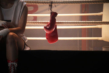 sitting on the edge of boxing ring - Powered by Adobe