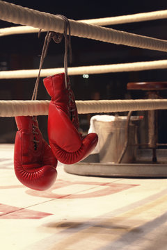 hanging boxing gloves on a rope in vertical
