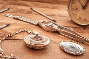 Antique wooden work table of a watchmaker.