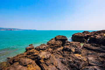 A volcanic rock by the sea.