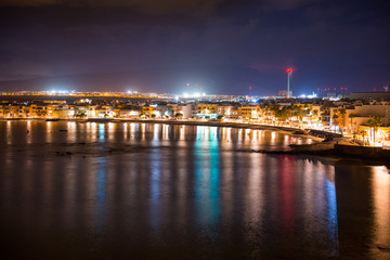 Fototapeta na wymiar Night view of illuminated coastal town