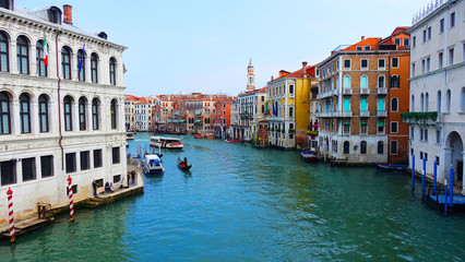 Obraz premium Water canal in Venezia or Venice, Italy with buildings and gondolas
