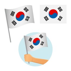 south korea flag in hand