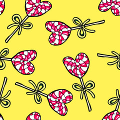 Christmas seamless pattern hand-drawn. New Year candy on a yellow background.Happy new year.