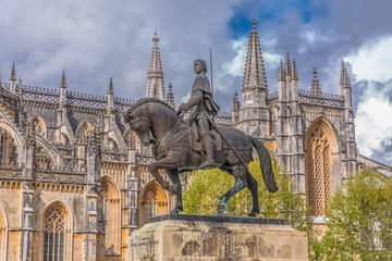 View of the ornate Gothic exterior facade of the Monastery of Batalha, Mosteiro da Batalha