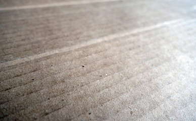 Fototapeta na wymiar Cardboard close-up with blur effect.