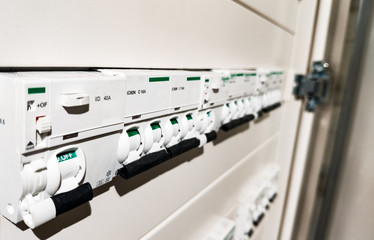 white automatic and differentials in white electrical panel