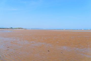 The wide expanse of Llanbedrog beach on the Llyn Peninsula at low tide