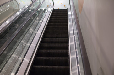 Escalator, moving staircase, from down to up