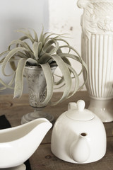 Retro white tableware on wooden table