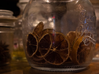dried lemon slice in the glass container. pub defocus background