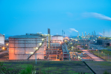 Oil refineries and oil depots and close-up of pipelines and destillation tanks of an oil-refinery...