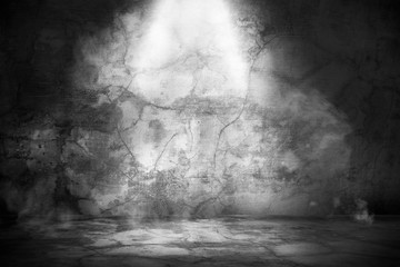 dark wall background with a light and perspective concept