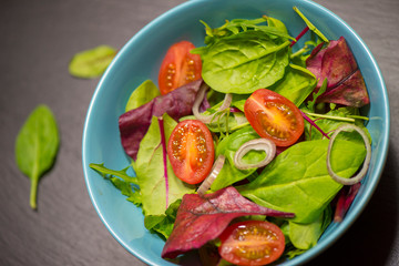 Leaf vegetable salad with tomato