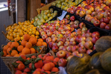 Farmers market with various domestic colorful fresh fruits and vegetable. Tasty colorful mix. Fruits in basket. Bio, healthy food. Vegetarian food.