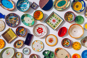 Collection of colorful Portuguese ceramic pottery, local craft products from Portugal. Ceramic...