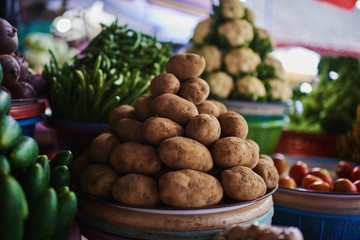 Street selling fruit and vegetable at market in Ubud town, Bali, Indonesia.