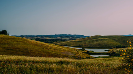 Fototapeta premium Beautiful landscape, tourist visit in in Tuscany, Italy. Summer, holiday, traveling concept.