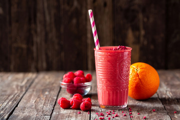 Ultimate refreshment health bomb smoothie in a glass served on the table