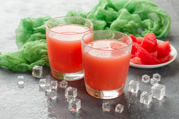 Two bottles of watermelon juice