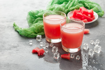 Two bottles of watermelon juice