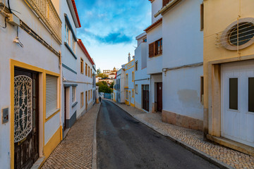 Street in the old town in the center of Lagos, Algarve region, Portugal. Narrow street in Lagos, Algarve, Portugal. Streets in the historic old town of Lagos, Algarve, Portugal.