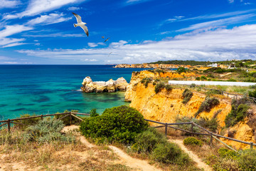 Coastal trail of Portimao on the Algarve coast. Overlooking the cliffs and ocean from the hiking...