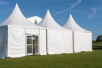 Marque in Petworth Park on a bright blue sky day