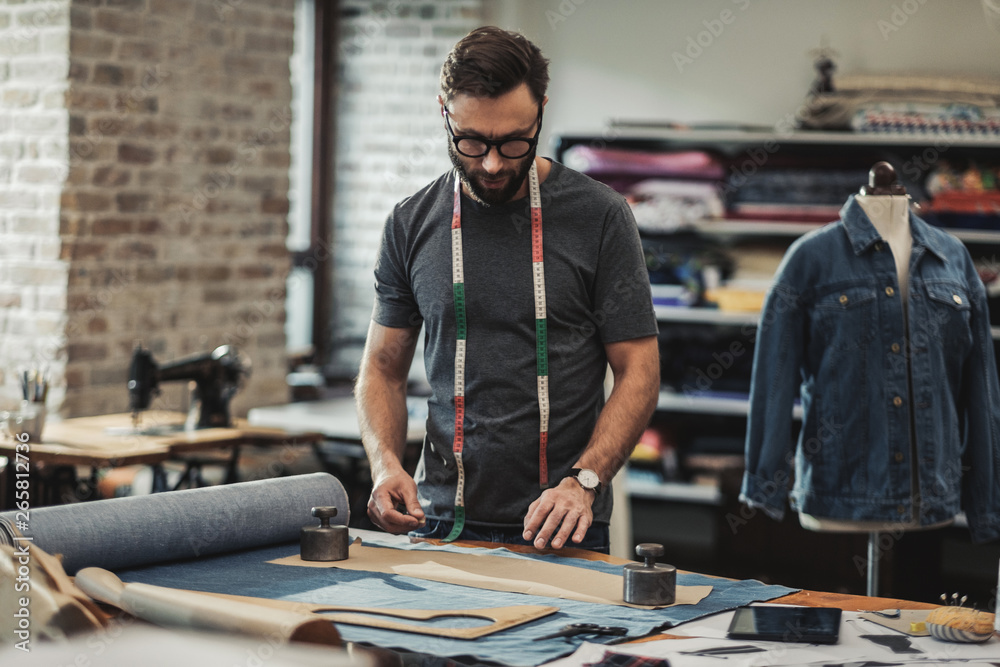 Sticker Fashion designer working in his studio