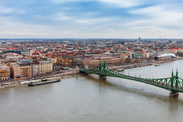 Fototapeta premium Panorama cityscape of famous tourist destination Budapest with Danube and bridges. Travel landscape in Hungary, Europe.
