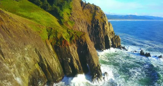 Dramatic View Of Rocky Pacific Coast With Surf Breaking On Sea Cliffs - Treasure Cove, Oregon, USA