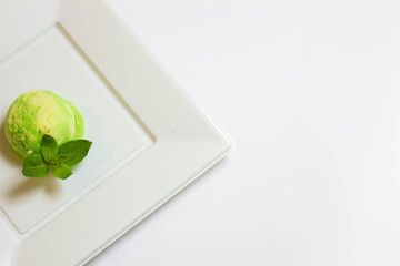 Set of ice cream scoops of different colors and flavours with fruits decoration isolated on white background 