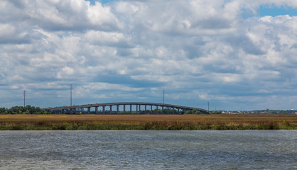 A bridge across a large expanse of saltwater wetland marsh