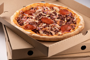 Pizza in a cardboard box