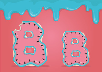 Whole and bitten delicious Latin letters B in the form of cookies with watermelon icing.