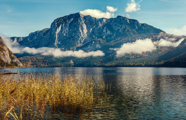 Beautiful summer day with Altaussee lake  and high mountains on the Background.