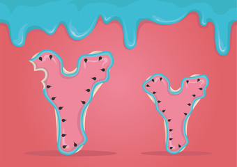 Whole and bitten delicious Latin letters Y in the form of cookies with watermelon icing.