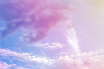 A soft fog cloud background with a pastel colored orange to blue gradient