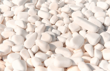 Fototapeta na wymiar white pebbles large stones close view