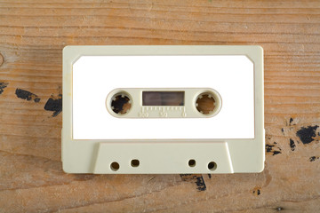 Vintage audio cassette tape with empty label, free copy space,flat lay