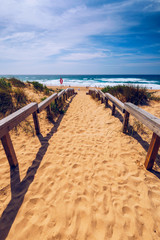 View of the Monte Clerigo beach on the western coastline of Portugal, Algarve. Stairs to beach Praia Monte Clerigo near Aljezur, Costa Vicentina, Portugal, Europe.