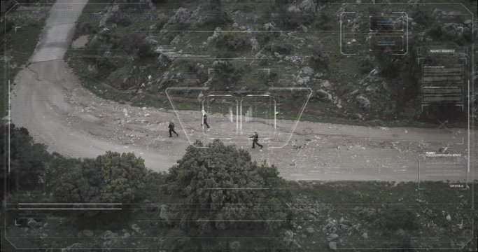 Surveillance drone camera view of terrorist squad walking with weapons