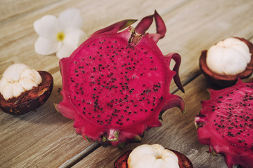 red Dragon Fruit and mangosteen on woodden background